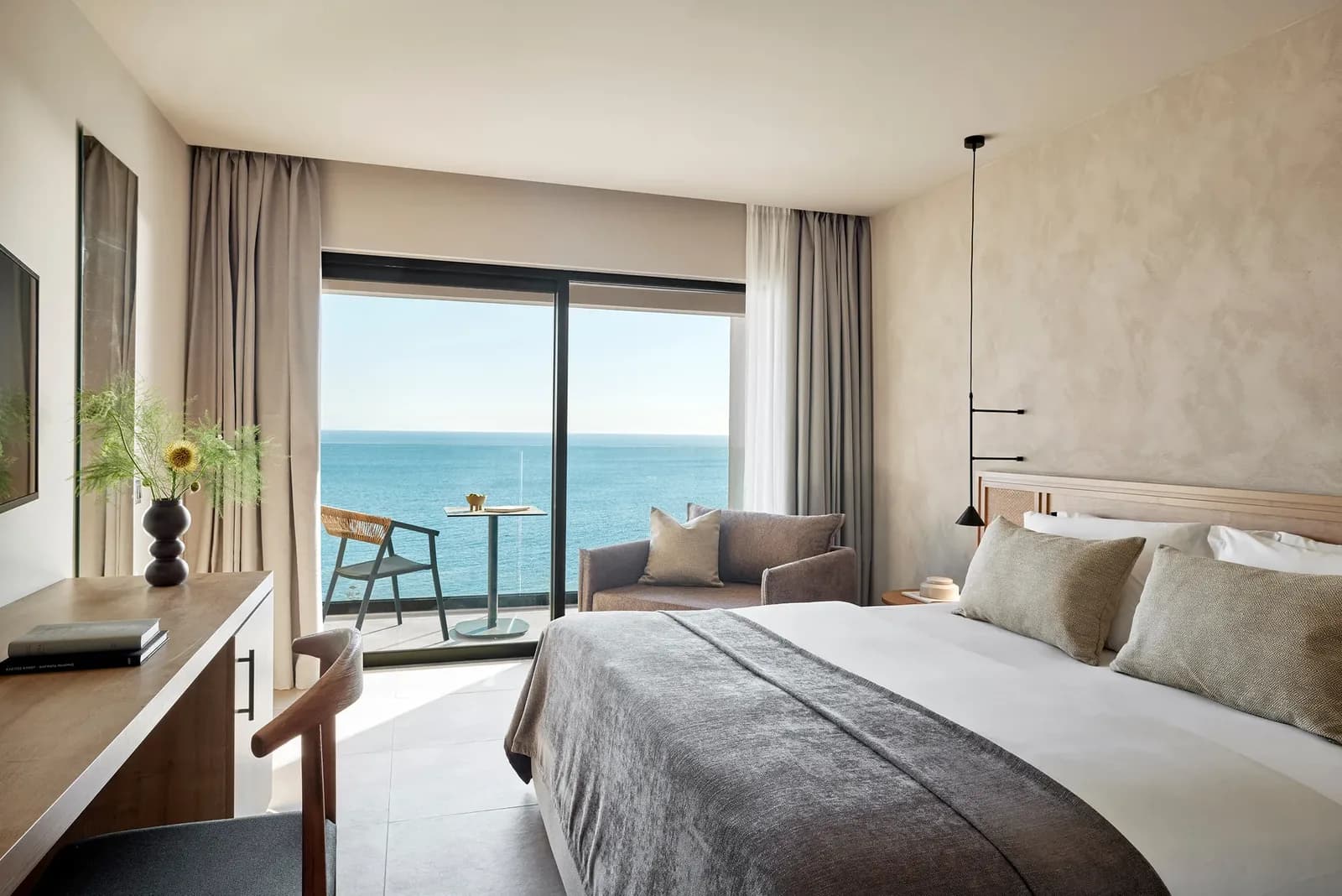 Hotel guest room with curtains and soft furnishings